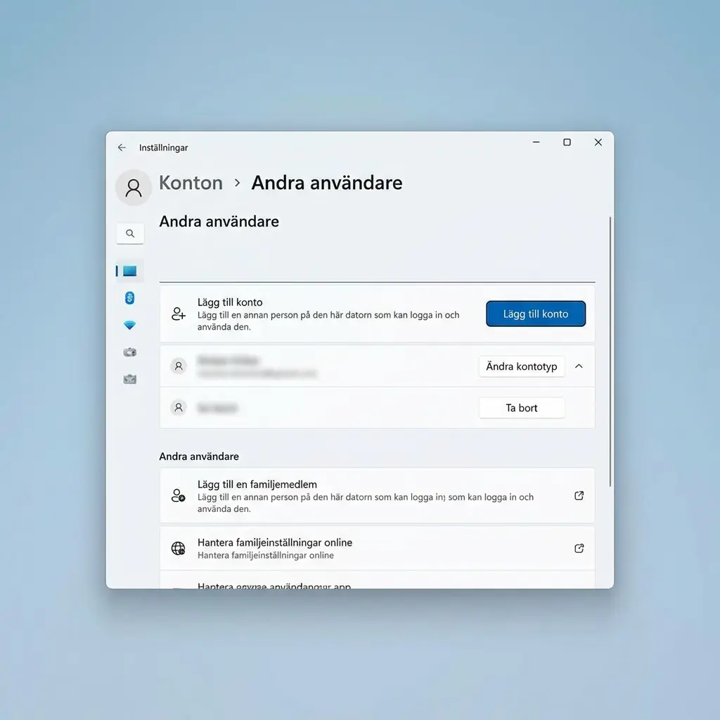 En laptop på ett skrivbord som visar Windows 11 inloggningsskärm med två konton — ett privat och ett gästkonto